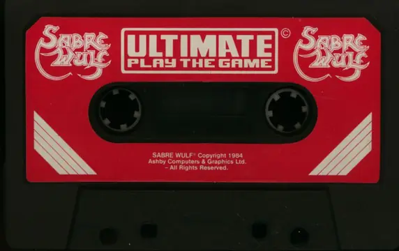 The red Ultimate cassette of Sabre Wulf, copyright 1984 Ashby Computers and Graphics